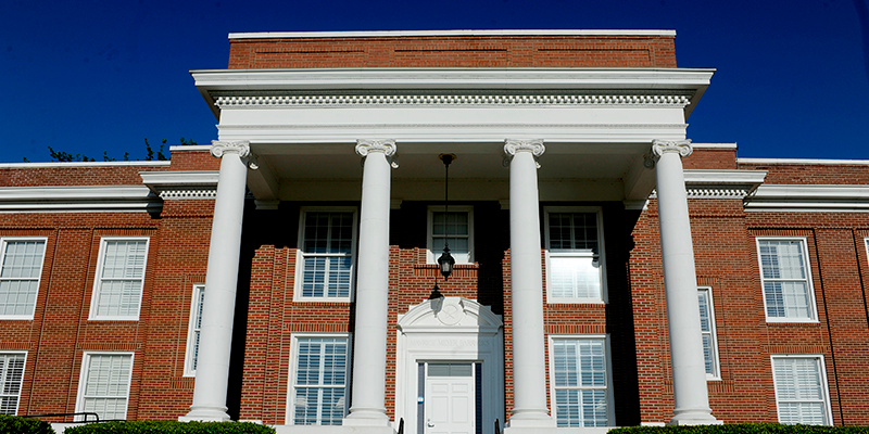 Meyer Hall - Brick building with white columns