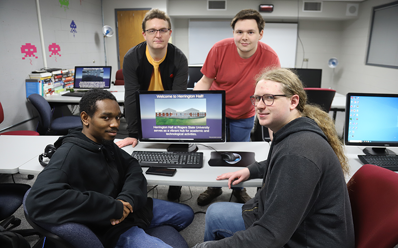 Game development team members who worked on the project to digitally recreate Herrington Hall included Quaveon Ransom of Tulsa (seated, from left) and Derrick Wilson, along with Kevin Terneus of Claremore (standing, from left) and Daniel Hutton of Tulsa.