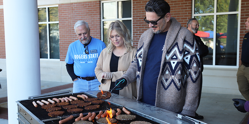 People grilling outside