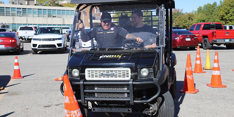 driving an atv with drunk driving simulator goggles