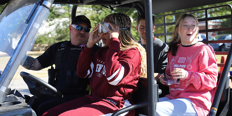 driving an atv with drunk driving simulator goggles