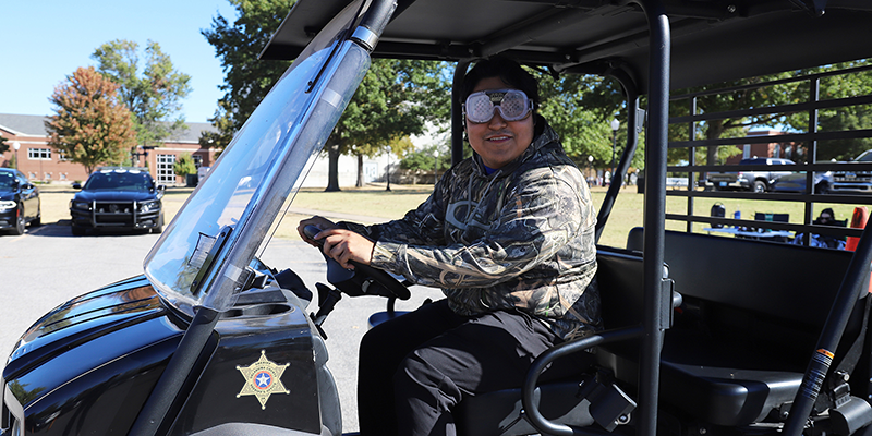 driving an atv with drunk driving simulator goggles