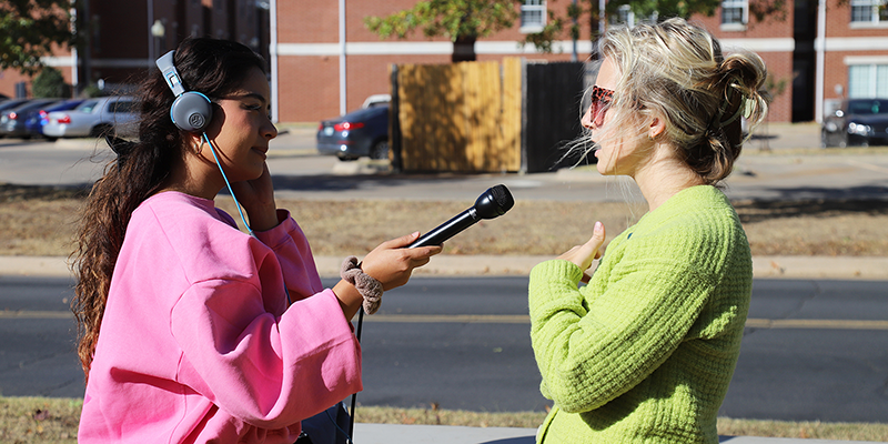 RSU Radio DJ Aby Molina interviews RSU Drug Prevention Coordinator Roxanne Bilby at the “Stomp the Stigma” Recovery Awareness Walk.