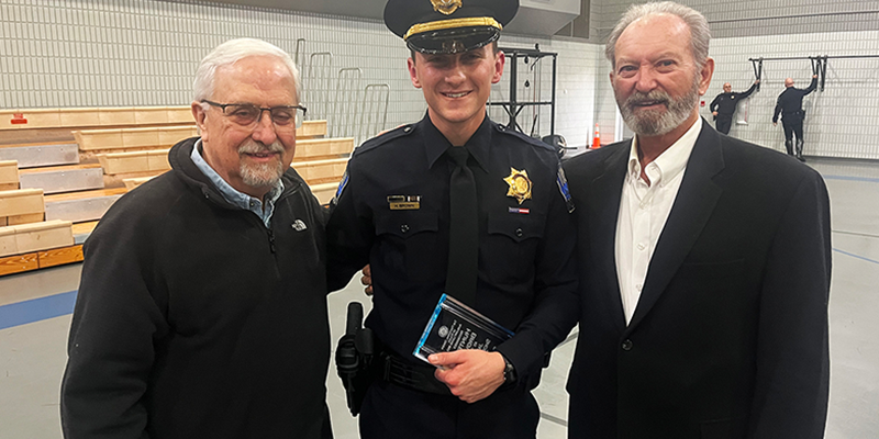 RSU Assistant Professor Gerry Bender (left) and Assistant Professor Rob Turner (right) congratulate RSU alumnus Hunter Brown (center) for the recent completion of his training at the Tulsa Police Academy. Collinsville native Bowen finished his training with top scholar honors.