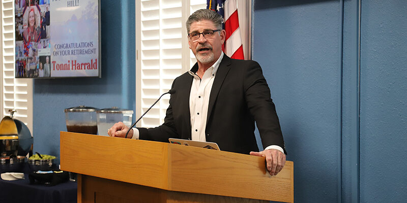 RSU Interim President Dr. Mark Rasor speaks during Tonni Harrald's retirement reception