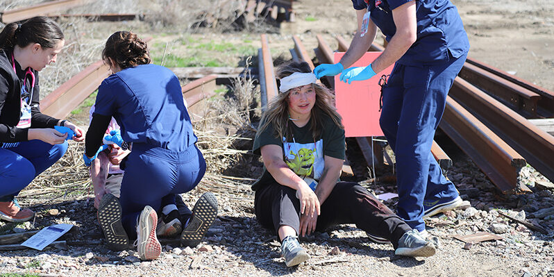 Multiple RSU nursing students participate in an outdoor mock disaster drill March 7.